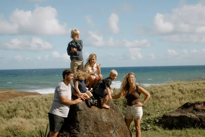 The Smee kids on a lava rock by the ocean